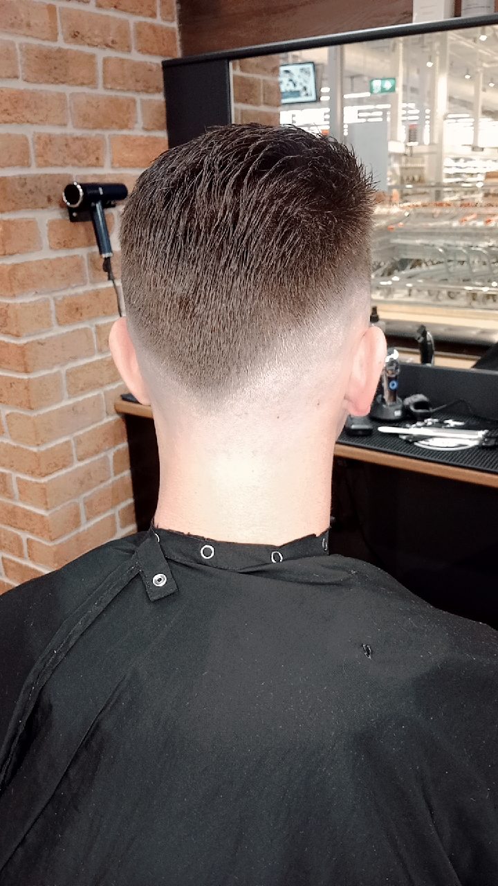 Back view of a fresh skin fade at Sports Barber